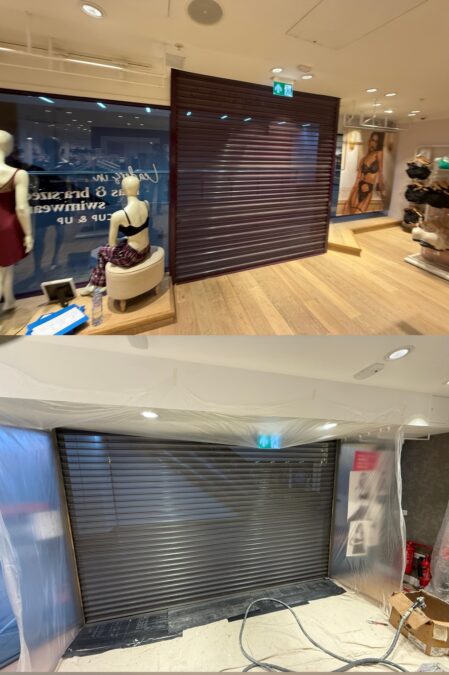 Professional spray painting of a retail shop front roller shutter in Stroud by Tall Marek Ltd